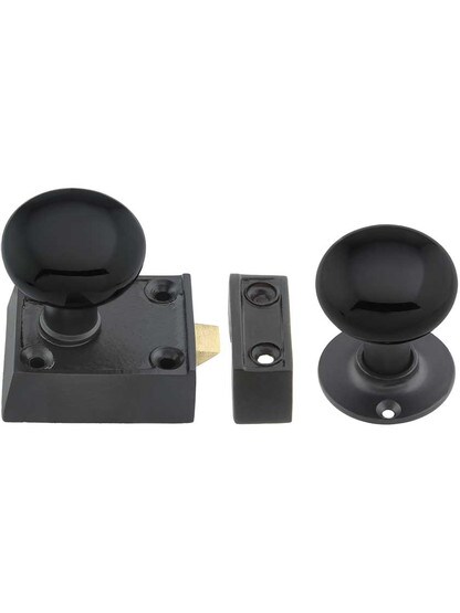 Small Cast Iron Rim Latch Set with Black Porcelain Knobs.